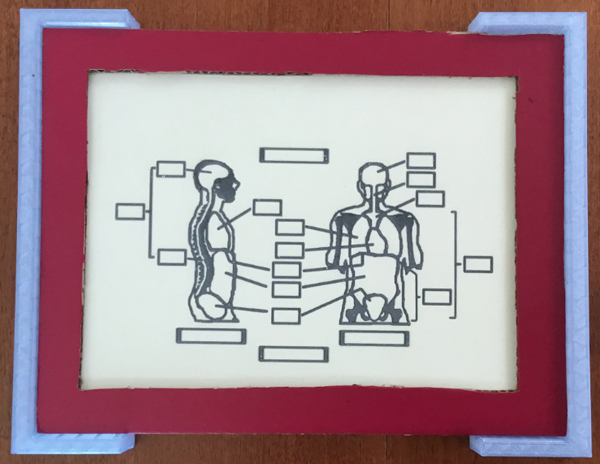 Fully assembled audio-enriched tactile template formed with red mat in place,